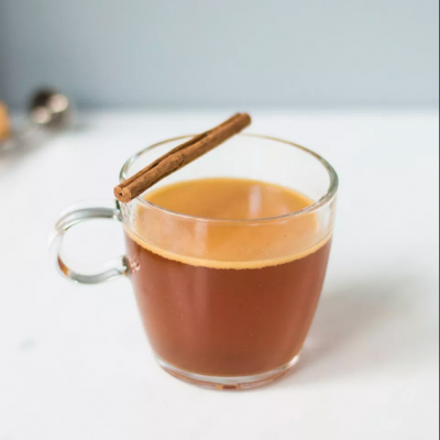 Hot buttered run drink with cinnamon stick. Lundeen Liquors recipe